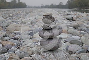 Rock pyramid along the river Brembo