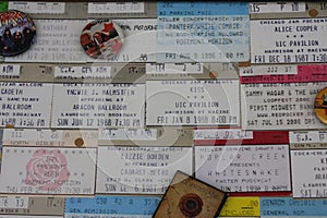 Rock and roll Concert ticket stubs and band buttons