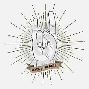 Rock and roll music hand. Typography graphic for clothes with sunray and ribbon. Print for t-shirts, poster, apparel. Vector.