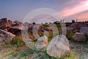 Rock and the rosy clouds