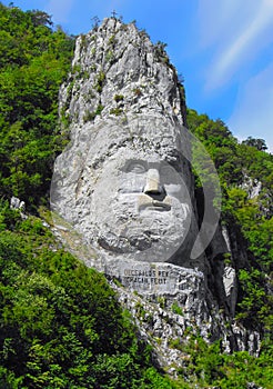 Rock sculpture of Decebalus on a rocky peak on the Danube river shore, Romania - capul lui Decebal