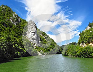 Rock sculpture landscape of Decebalus on a rocky peak on the Danube river, Romania