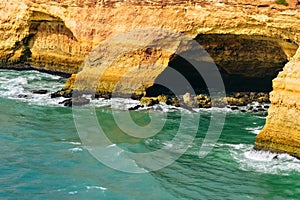 Rock by the sea. the concept of harmony, energy of life and meditation. benagil beach in portugal