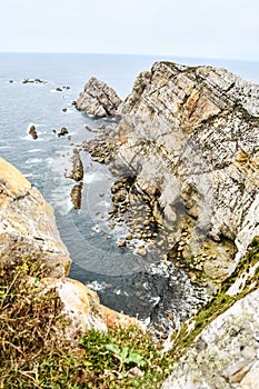 rock and sea, photo as a background , in playa del silencio , silent beach, principado de asturias, spain europe photo