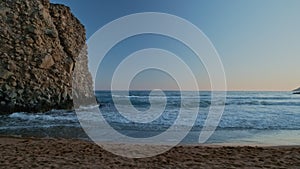Rock and sea waves of Fyriplaka beach, Milos, Greece at sunset. Concept of zen, relax, meditation, eternity