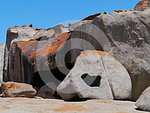 Rock shapes with orange lichen