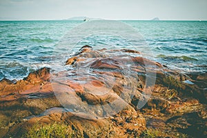 Rock shore with beautiful seascape view at Chao Lao Beach, Chanthaburi Province.