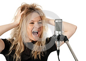 Rock singer screaming to the microphone