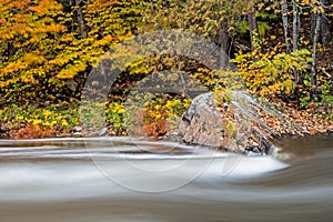 Rock Sits Solid In The Rapids Of The Oxtongue River