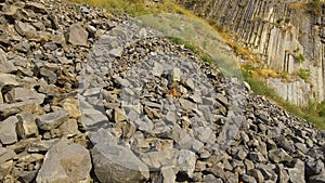 Rock slides and stones scattered over hills, risk of mudflow, geology science