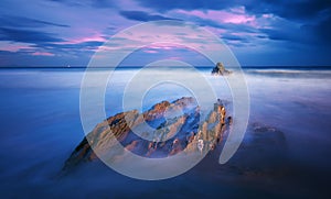 Rock in Sopelana beach at night