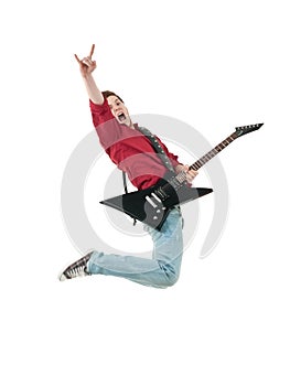 Rock star with a guitar jumping