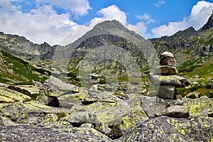 Rock statues built in the valley below Strbsky Peak near Lake above the Skok waterfall.