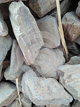 ROCK OR STONE IS A NATURAL SUBSTANCE ,A SOLID AGGREGATE