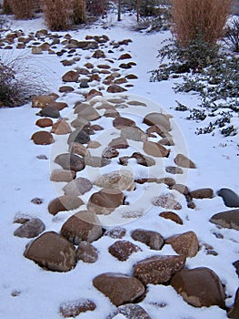 Rock and stone pathway covered in a winter snow. Boise, Idaho