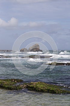 Rock in a stormy sea