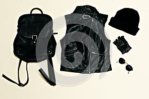 Rock style set. Black Urban fashion. Vest, Backpack cap. Black leather clothing