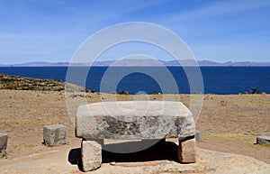 Rock table with a view from Isla del Sol on Titicaca lake, Bolivia photo
