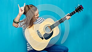 Rock on with teenager girl and guitar music.