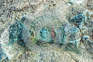 Rock texture with green pattern