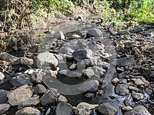 rock texture of a small river when the water recedes in a village in Indonesia 10