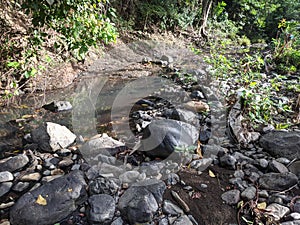 rock texture of a small river when the water recedes in a village in Indonesia 12