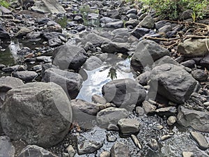 rock texture of a small river when the water recedes in a village in Indonesia 16