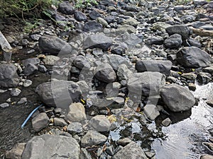 rock texture of a small river when the water recedes in a village in Indonesia 21