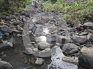 rock texture of a small river when the water recedes in a village in Indonesia 26