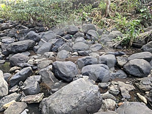 rock texture of a small river when the water recedes in a village in Indonesia 3