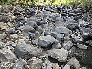 rock texture of a small river when the water recedes in a village in Indonesia 5