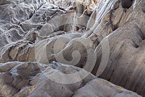 Stone texture in snow and ice. Mountain wall. Rock texture.