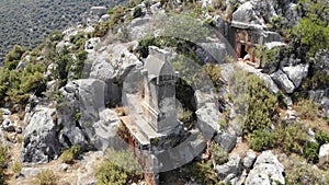 Rock tombs, tombstones and sarcophagi on a mountainside near the ancient city of Sura. Turkey