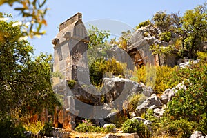 Rock tombs, tombstones and sarcophagi on a mountainside near ancient city of Sura. Turkey