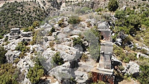 Rock tombs, tombstones and sarcophagi on a mountainside near the ancient city of Sura. Turkey