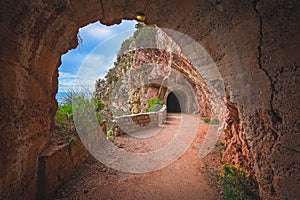 Rock tunnel in Petrovac Bay photo
