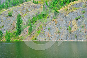 Rock wall Of  Rose Valley Lake In West Kelowna BC  Canada