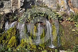 Rock with waterfalls, Iturup Island, South Kuriles