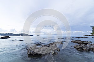 Rock and wave on the Ao Sen beach Phuket