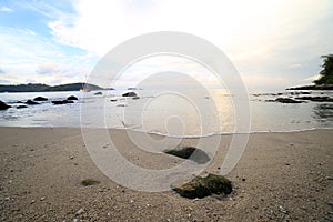 Rock and wave on the Ao Sen beach Phuket