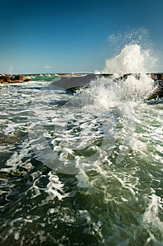 Rock and waves in the sea