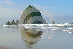 The rock Â«head of yaquinaÂ» on the coast of the Pacific Ocean. USA. Oregon