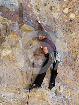 Rockclimbing man photo
