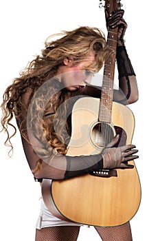 Rocker girl with acoustic guitar