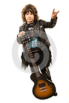 Rocker kid boy with electric guitar