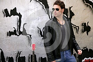 Rocker rock star young man sunglasses