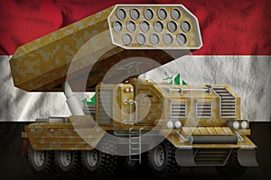 Rocket artillery, missile launcher with sand camouflage on the Iraq national flag background. 3d Illustration