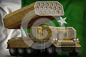 Rocket artillery, missile launcher with sand camouflage on the Pakistan national flag background. 3d Illustration