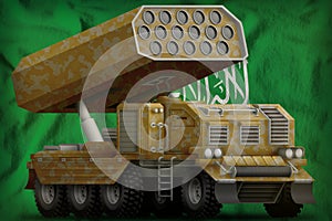 Rocket artillery, missile launcher with sand camouflage on the Saudi Arabia national flag background. 3d Illustration