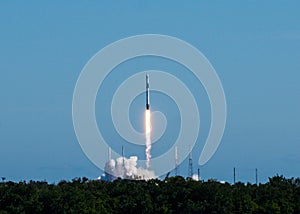 Rocket launch on a clear blue sky cloudless day